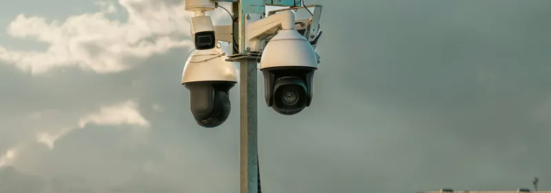 PTZ dome security cameras mounted on an outdoor pole